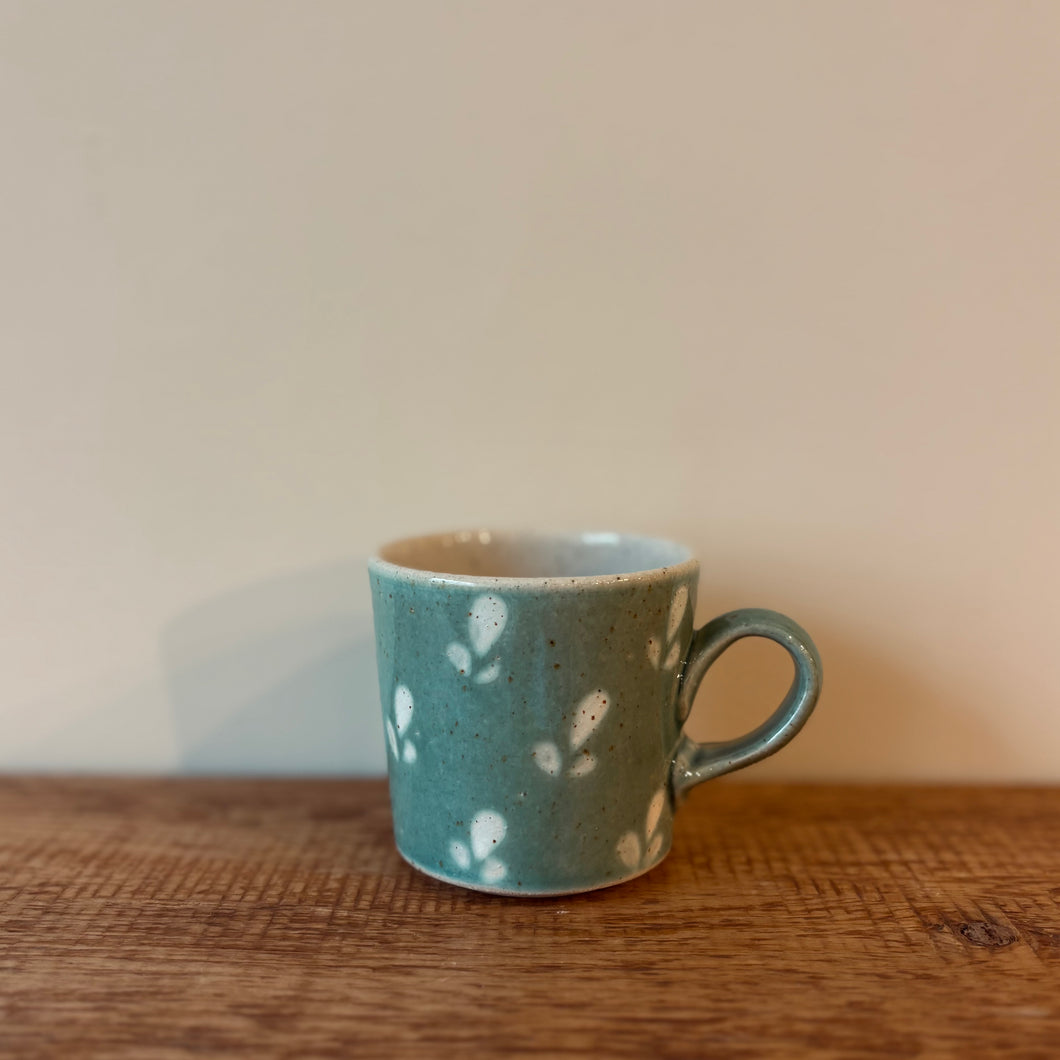 Green small coffee cup